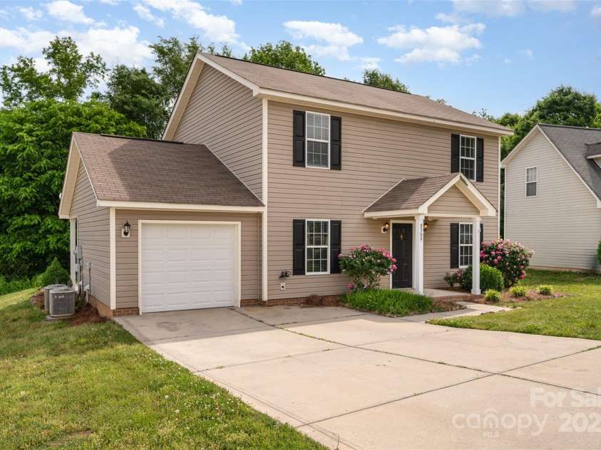 8309 Knapp Court, Locust, NC 28097.  MLS# CAR4222217, YatesRealty ID 11010. Left side view