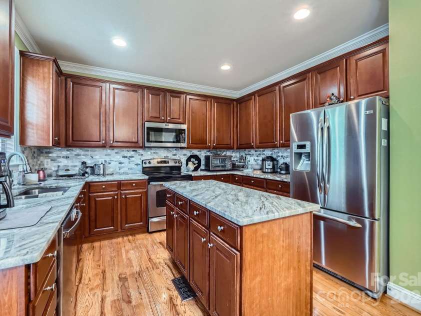 10836 Maryanna Court, Charlotte, NC 28213.  MLS# CAR4248594, YatesRealty ID 11011. Another View of the Kitchen all the Cabinets & Counter Space