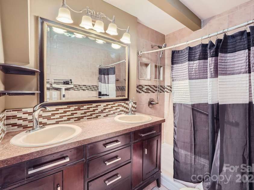 10836 Maryanna Court, Charlotte, NC 28213.  MLS# CAR4248594, YatesRealty ID 11011. Primary Bathroom with Double Sink & Shower