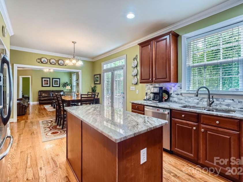 10836 Maryanna Court, Charlotte, NC 28213.  MLS# CAR4248594, YatesRealty ID 11011. View of the Kitchen Dining Area with a view of the open concept & all the Natural Sunlight beaming in