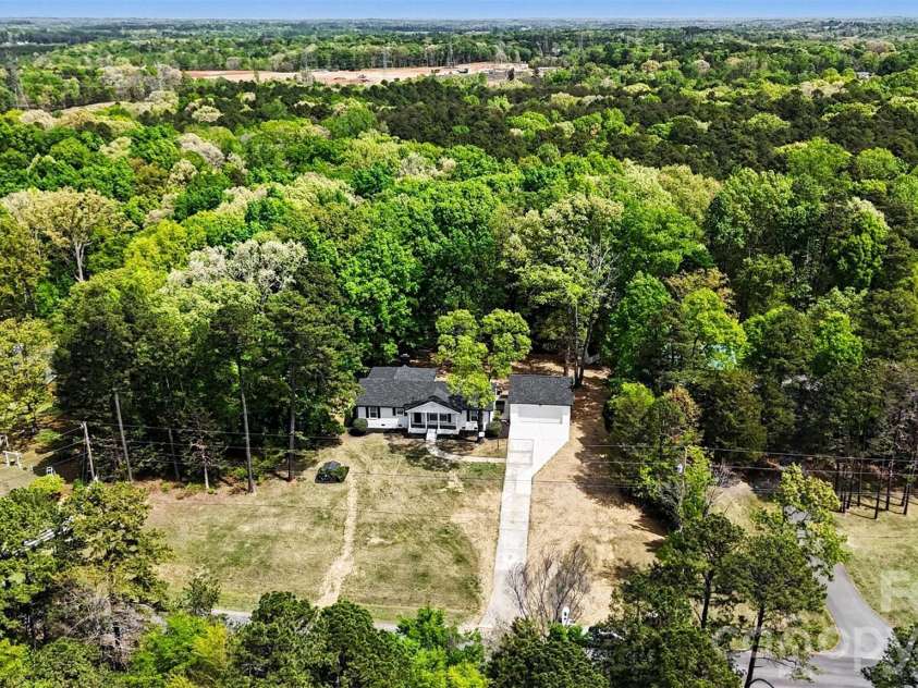 11630 Trails End Lane, Huntersville, NC 28078.  MLS# CAR4342080, YatesRealty ID 11011. Property adjoins nature preserve and regional park area