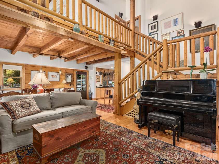 102 and 104 Carriage Drive, Fairview, NC 28730.  MLS# CAR4354693, YatesRealty ID 11013. Open Floorplan On Main Level Connects Living, Dining, And Kitchen While Lofted Upper Level Extends Living Area - Providing Flexible Spaces For Everyday Living & Entertaining