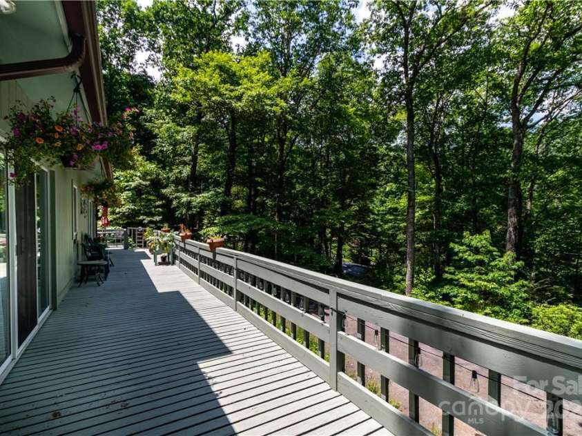 597 Sweetwater Ridge, Burnsville, NC 28714.  MLS# CAR4251811, YatesRealty ID 11017. Front deck