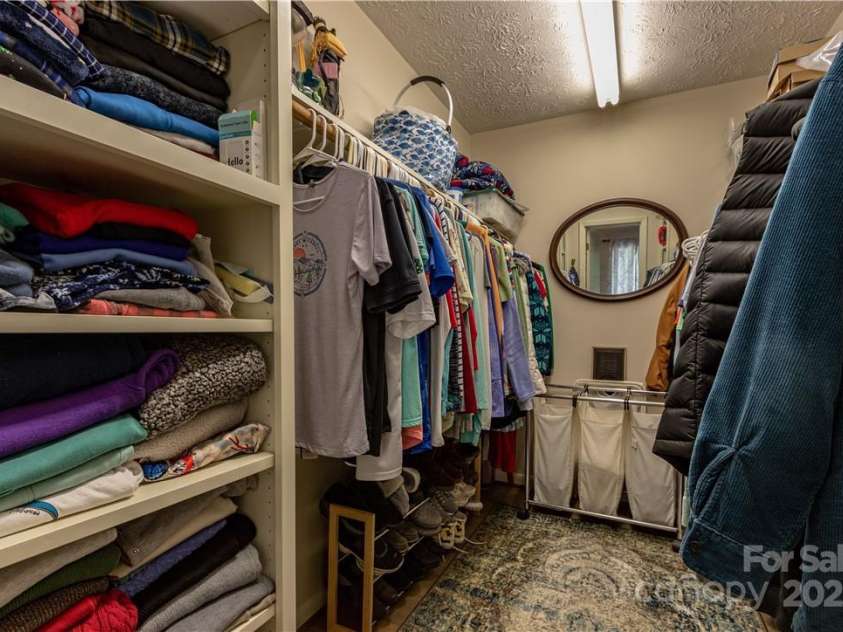 597 Sweetwater Ridge, Burnsville, NC 28714.  MLS# CAR4251811, YatesRealty ID 11017. Walk-in closet