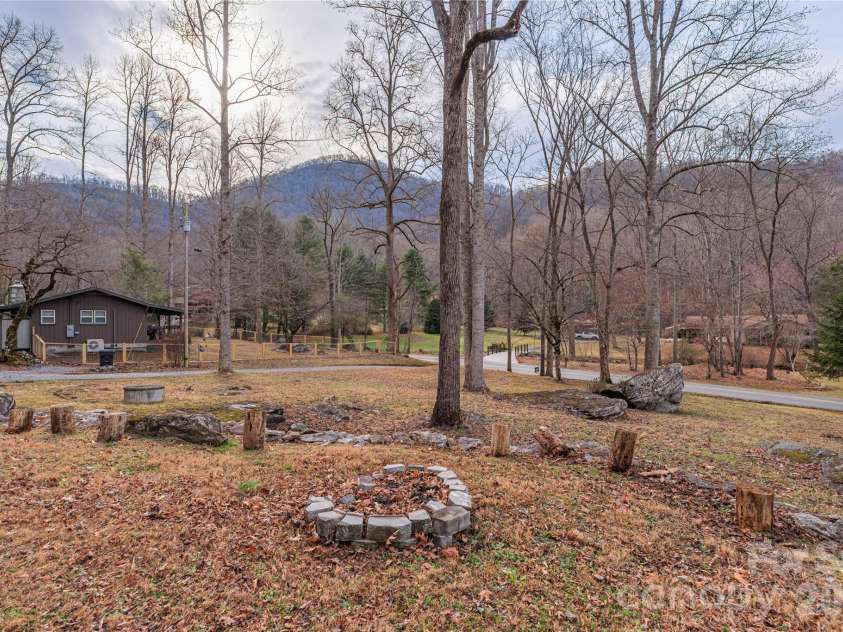 3415 Conleys Creek Road, Whittier, NC 28789.  MLS# CAR4336563, YatesRealty ID 1102. Front yard view