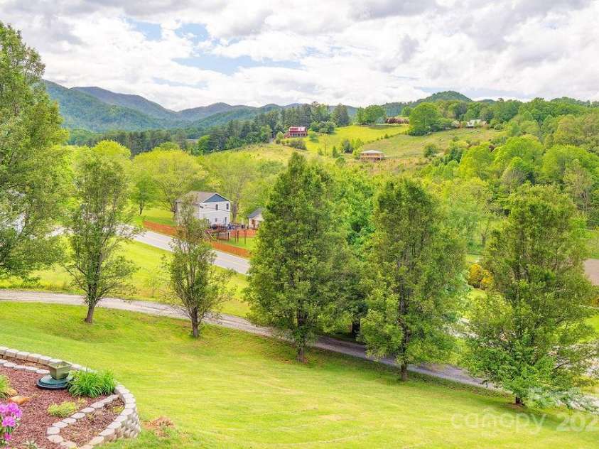 908 Newfound Road, Leicester, NC 28748.  MLS# CAR4248358, YatesRealty ID 11021. 