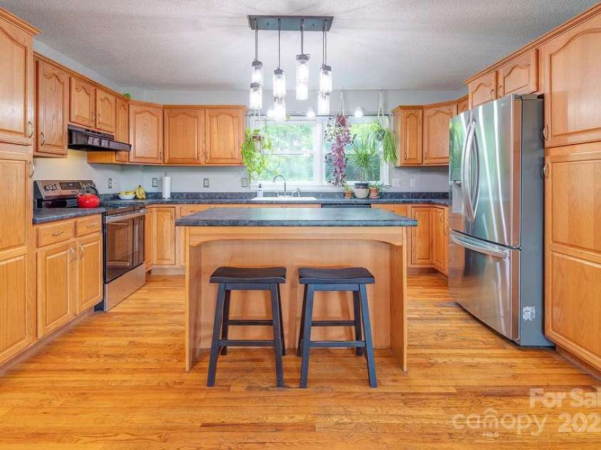 908 Newfound Road, Leicester, NC 28748.  MLS# CAR4248358, YatesRealty ID 11021. 