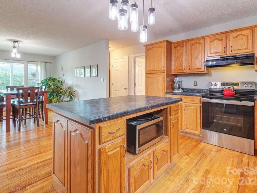 908 Newfound Road, Leicester, NC 28748.  MLS# CAR4248358, YatesRealty ID 11021. 
