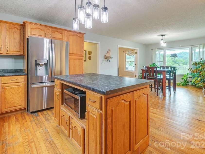 908 Newfound Road, Leicester, NC 28748.  MLS# CAR4248358, YatesRealty ID 11021. 