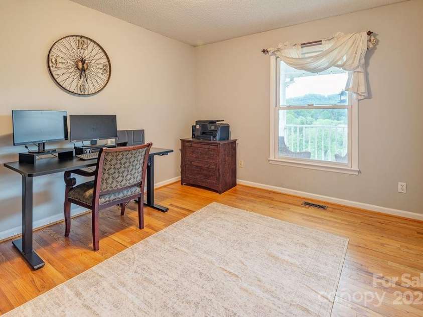 908 Newfound Road, Leicester, NC 28748.  MLS# CAR4248358, YatesRealty ID 11021. 