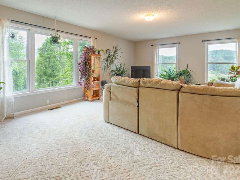 908 Newfound Road, Leicester, NC 28748.  MLS# CAR4248358, YatesRealty ID 11021. 