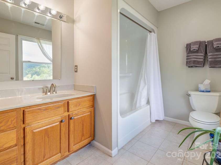 908 Newfound Road, Leicester, NC 28748.  MLS# CAR4248358, YatesRealty ID 11021. 
