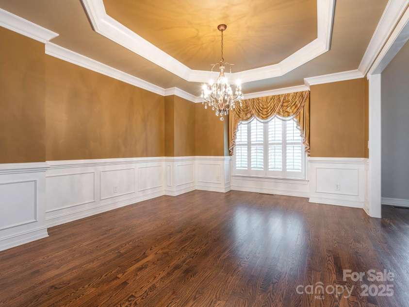 3850 Hounslow Lane, Harrisburg, NC 28075.  MLS# CAR4216435, YatesRealty ID 11023. Ample sized dining room with gorgeous moldings