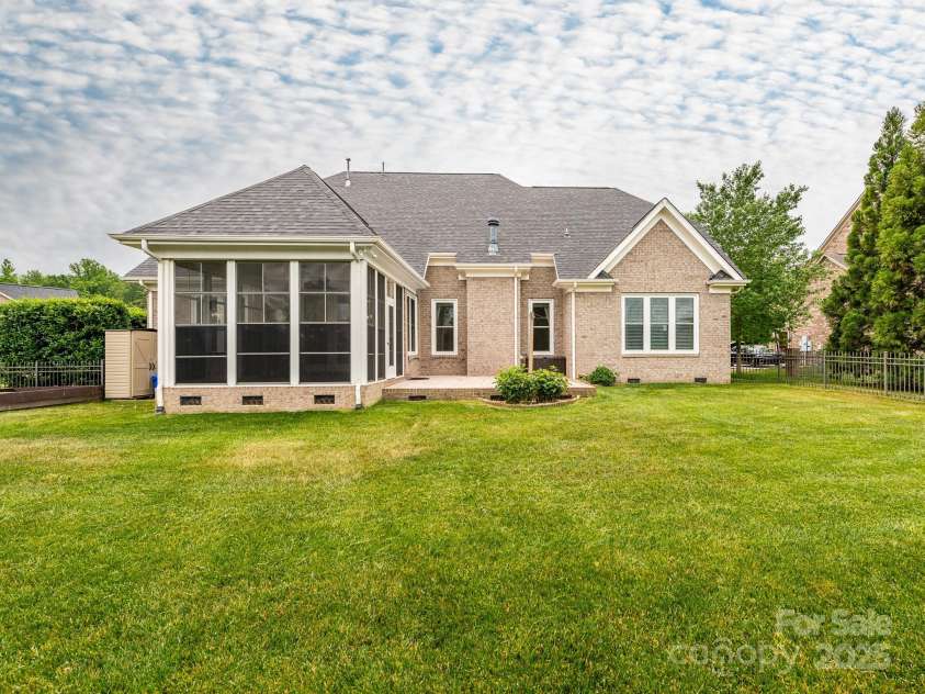 3850 Hounslow Lane, Harrisburg, NC 28075.  MLS# CAR4216435, YatesRealty ID 11023. Large fenced back yard