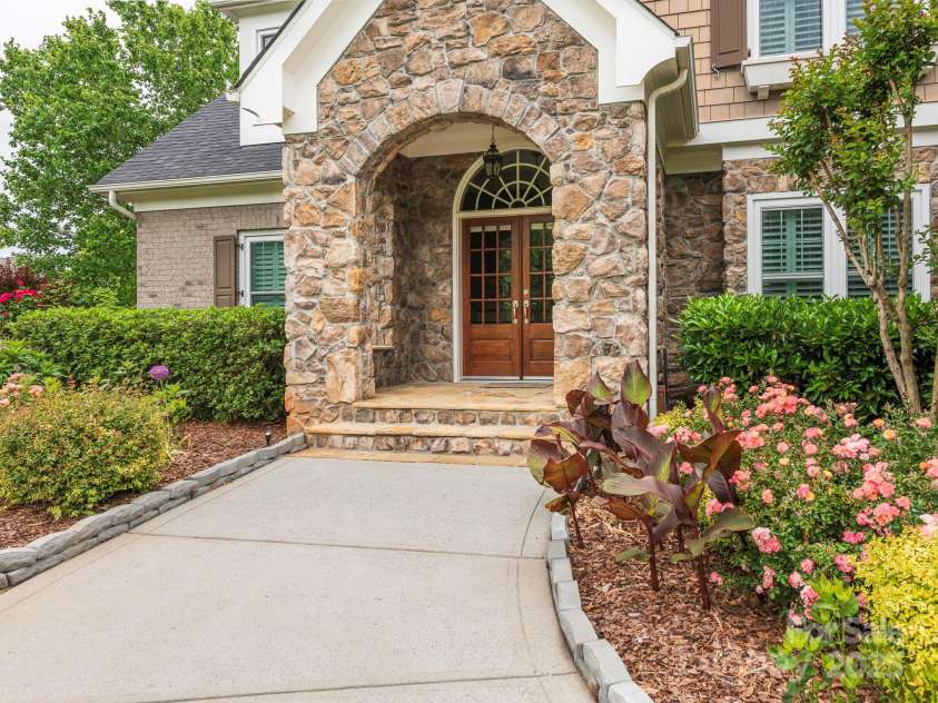 3850 Hounslow Lane, Harrisburg, NC 28075.  MLS# CAR4216435, YatesRealty ID 11023. Welcoming front porch