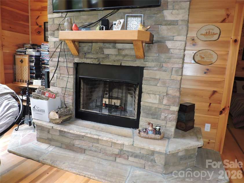 103 Chucks Lane, Bakersville, NC 28705.  MLS# CAR4364446, YatesRealty ID 11028. Magnificent Fireplace