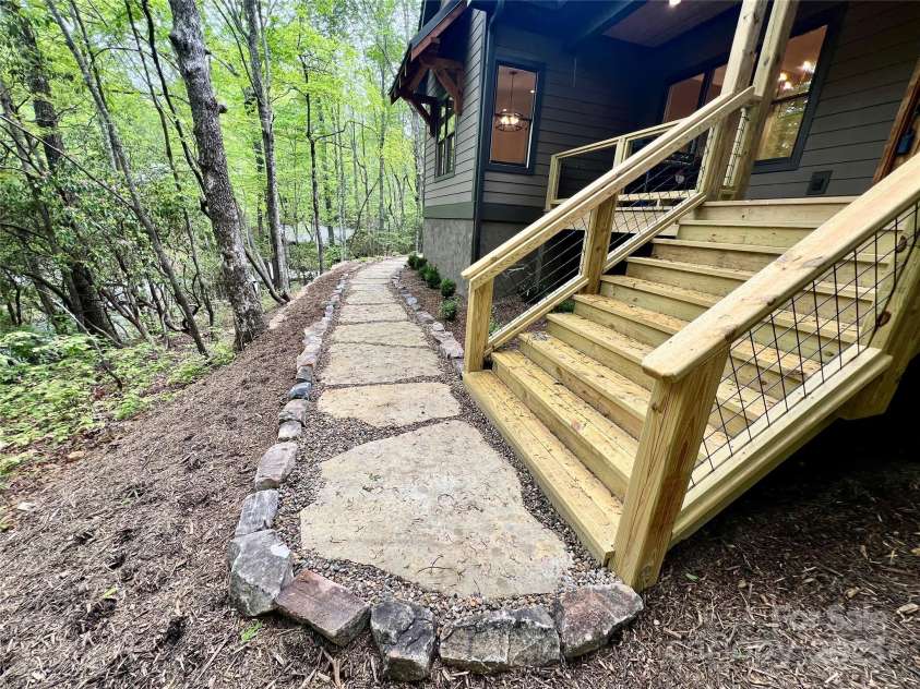 435 Soquili Drive, Brevard, NC 28712.  MLS# CAR4255595, YatesRealty ID 11035. Rocking-Chair Front Porch