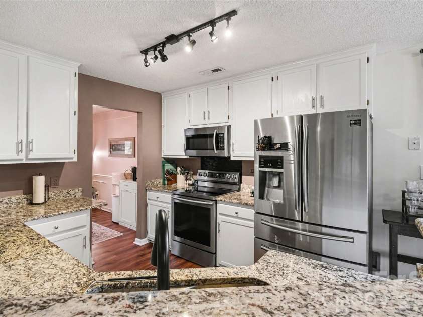 4476 Greystone Drive, Concord, NC 28027.  MLS# CAR4366117, YatesRealty ID 11040. 