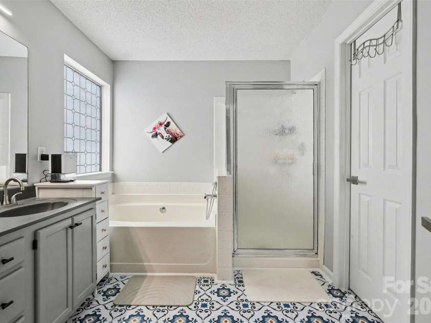 4476 Greystone Drive, Concord, NC 28027.  MLS# CAR4366117, YatesRealty ID 11040. 