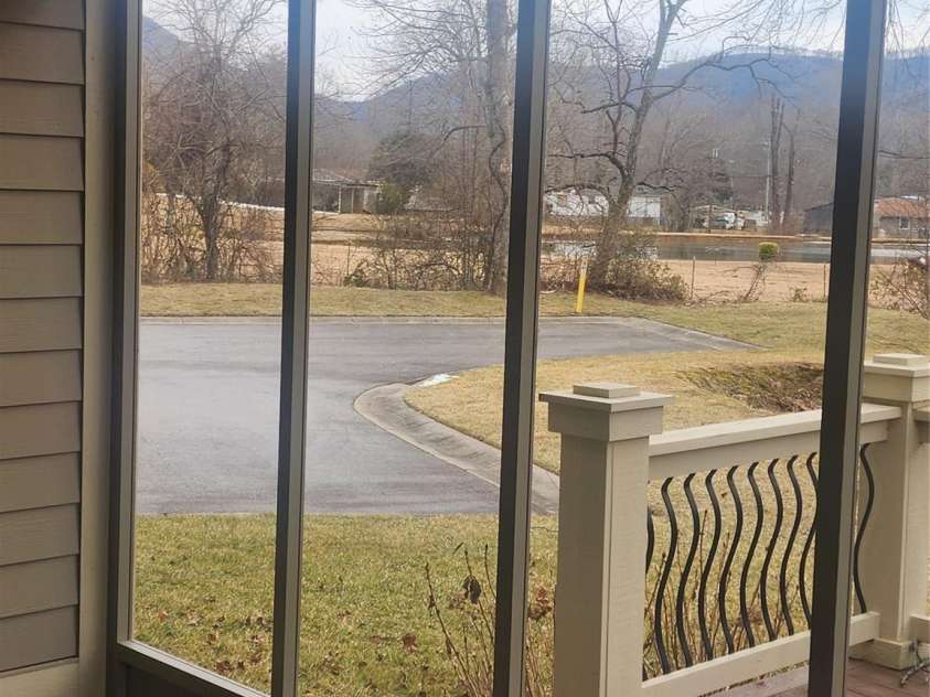 62 River Bend Lane, Fletcher, NC 28732.  MLS# CAR4335213, YatesRealty ID 11041. Porch view 