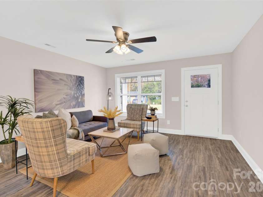 2833 Southwest Boulevard, Charlotte, NC 28216.  MLS# CAR4349189, YatesRealty ID 11042. Living room 
