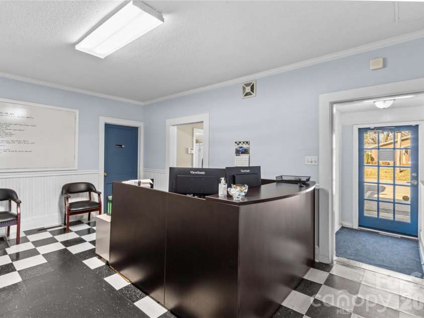 1120 Davie Avenue, Statesville, NC 28677.  MLS# CAR4326413, YatesRealty ID 11044. Large front room/office measuring approx 32 x 14!