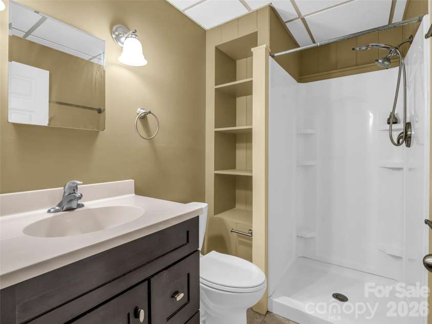 417 Ivy Road, Black Mountain, NC 28711.  MLS# CAR4362161, YatesRealty ID 11048. Basement bathroom with walk-in shower
