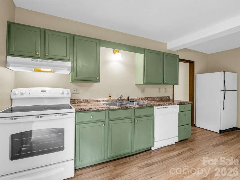 417 Ivy Road, Black Mountain, NC 28711.  MLS# CAR4362161, YatesRealty ID 11048. Kitchen in basement