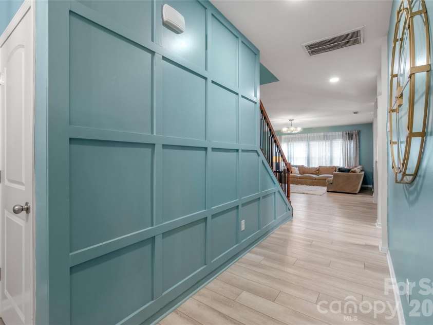 10229 Snowbell Court, Charlotte, NC 28215.  MLS# CAR4338183, YatesRealty ID 1105. Accent wall in hall