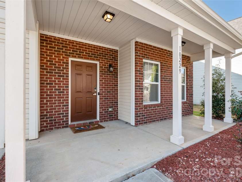 10229 Snowbell Court, Charlotte, NC 28215.  MLS# CAR4338183, YatesRealty ID 1105. Front Porch