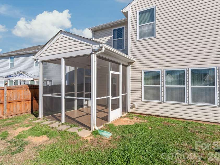 10229 Snowbell Court, Charlotte, NC 28215.  MLS# CAR4338183, YatesRealty ID 1105. Screened porch