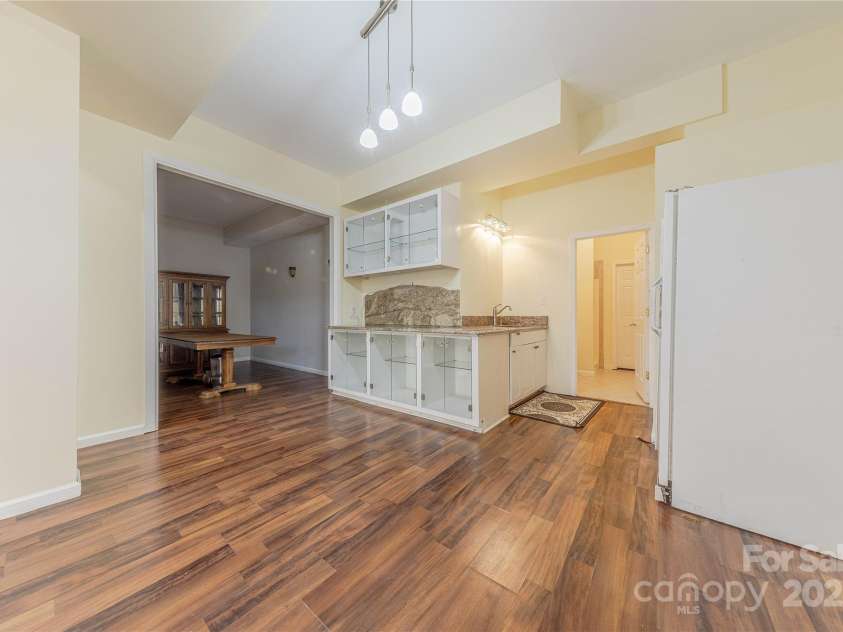4225 Nathaniel Glen Court, Matthews, NC 28105.  MLS# CAR4213863, YatesRealty ID 11050. Basement Kitchenette