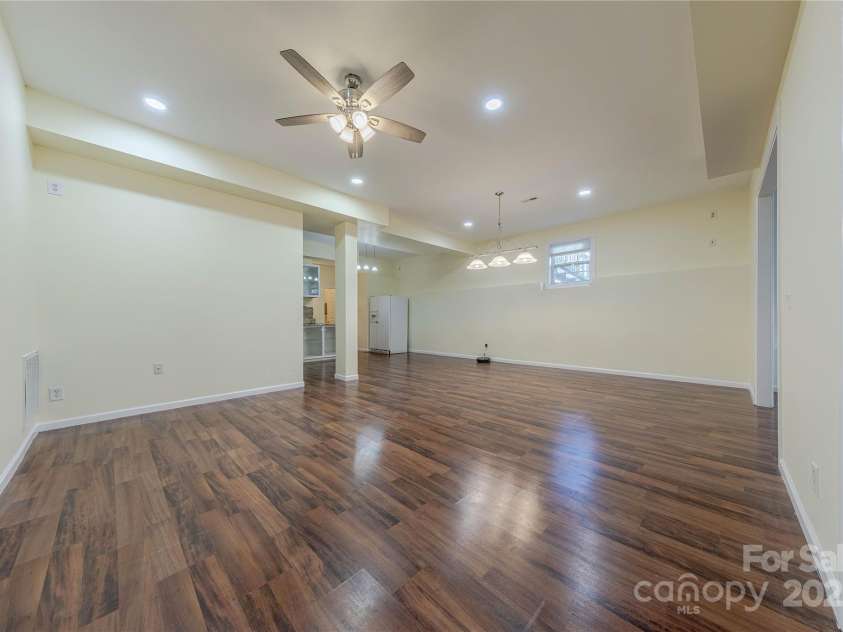 4225 Nathaniel Glen Court, Matthews, NC 28105.  MLS# CAR4213863, YatesRealty ID 11050. Finished Basement