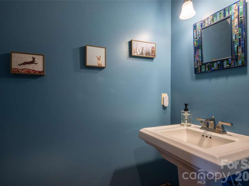 126 Wildflower Cove Drive, Swannanoa, NC 28778.  MLS# CAR4427361, YatesRealty ID 11052. Half Bath on the main level