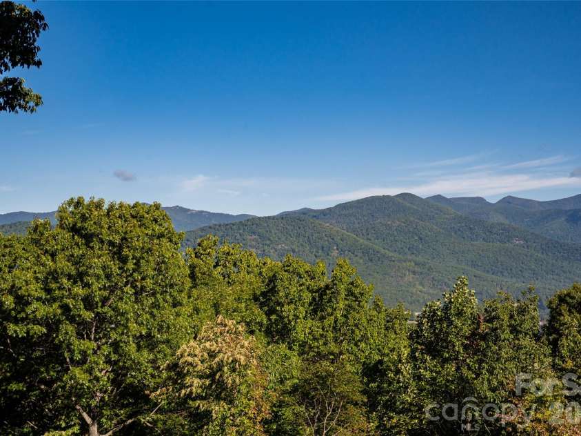 126 Wildflower Cove Drive, Swannanoa, NC 28778.  MLS# CAR4427361, YatesRealty ID 11052. Long range mountain views