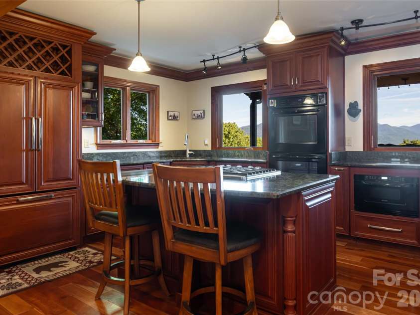 126 Wildflower Cove Drive, Swannanoa, NC 28778.  MLS# CAR4427361, YatesRealty ID 11052. Magnificent views from the kitchen