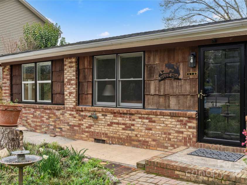 513 Paradise Circle, Belmont, NC 28012.  MLS# CAR4219509, YatesRealty ID 11053. Brick ranch with cedar shake accents