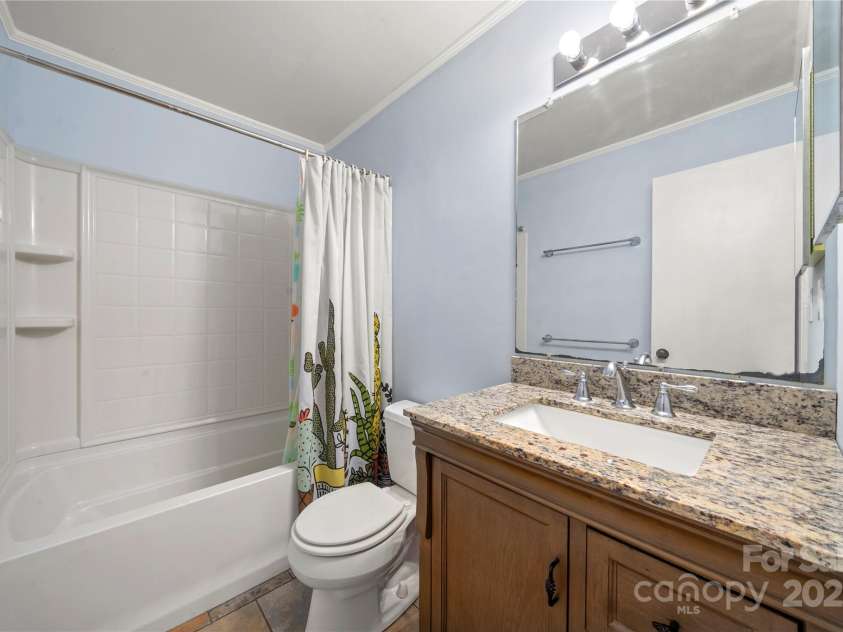 513 Paradise Circle, Belmont, NC 28012.  MLS# CAR4219509, YatesRealty ID 11053. Hall Bathroom