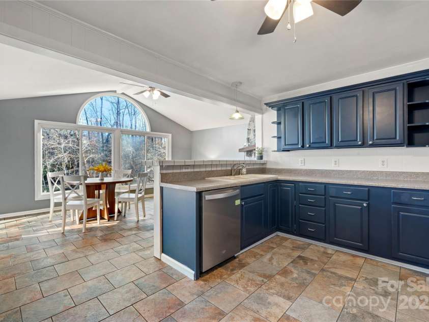 513 Paradise Circle, Belmont, NC 28012.  MLS# CAR4219509, YatesRealty ID 11053. Open to dining room featuring cathedral ceiling