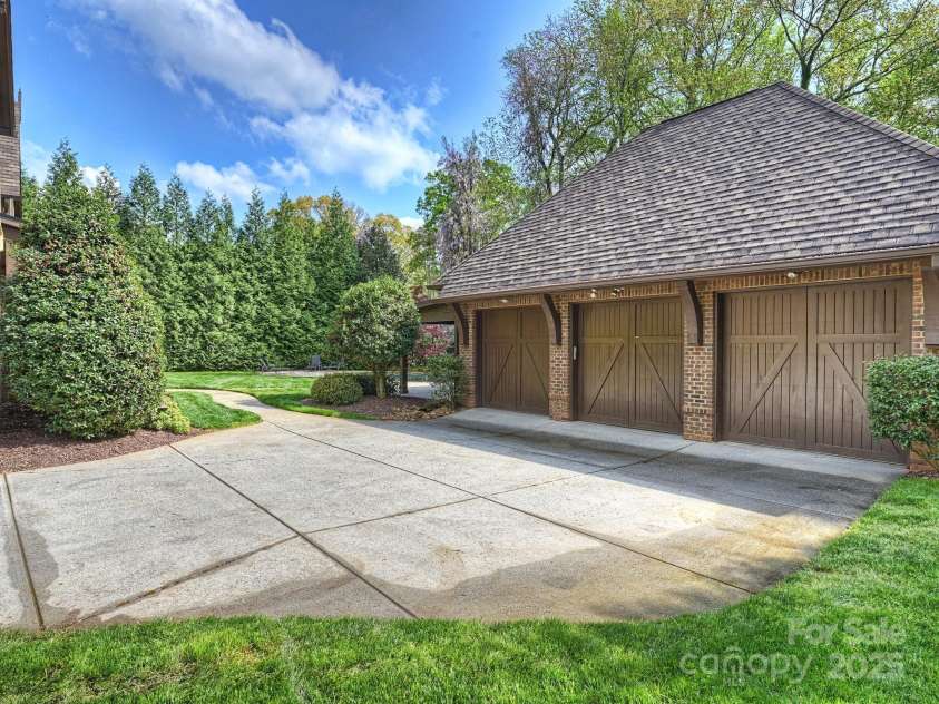 4400 Sharon View Road, Charlotte, NC 28226.  MLS# CAR4243534, YatesRealty ID 11056. 3-Car Garage Motorcourt