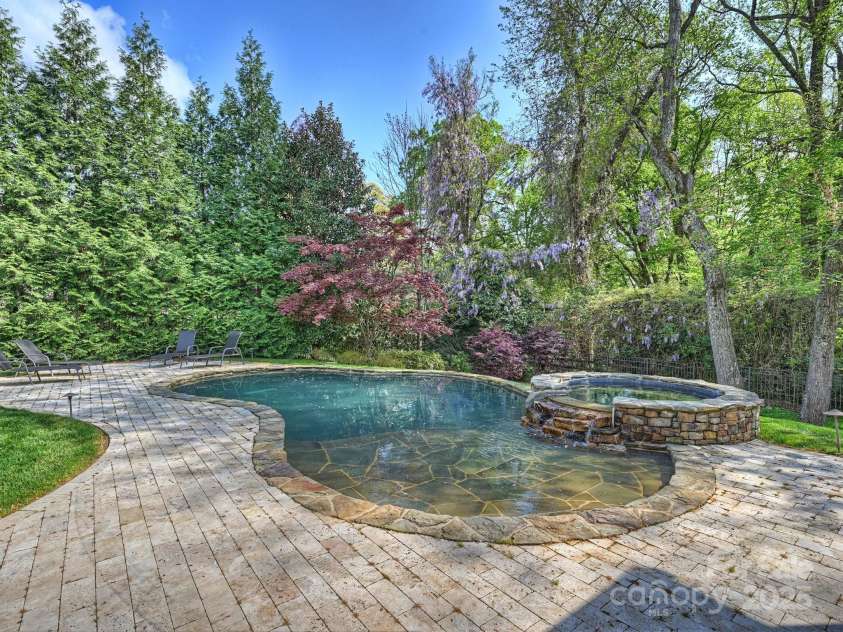 4400 Sharon View Road, Charlotte, NC 28226.  MLS# CAR4243534, YatesRealty ID 11056. Covered Porch overlooking private backyard