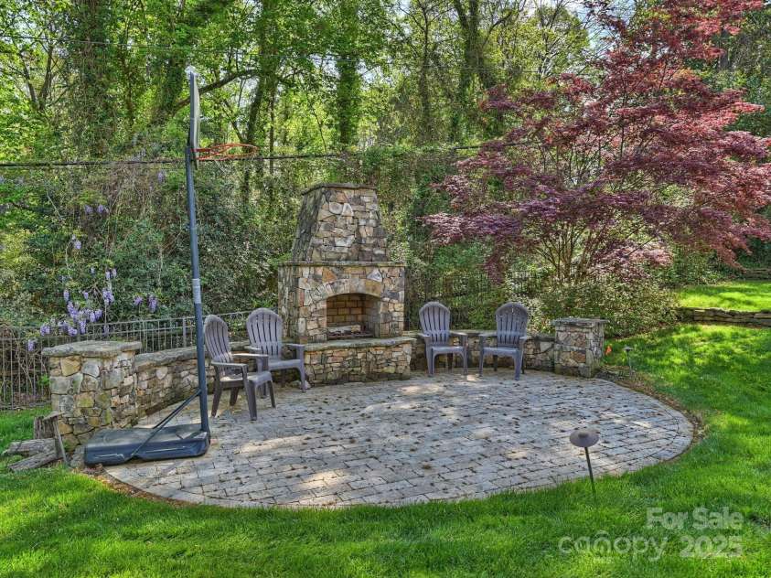 4400 Sharon View Road, Charlotte, NC 28226.  MLS# CAR4243534, YatesRealty ID 11056. Outdoor fireplace