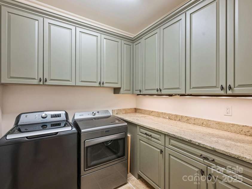 4400 Sharon View Road, Charlotte, NC 28226.  MLS# CAR4243534, YatesRealty ID 11056. Upper Level Laundry