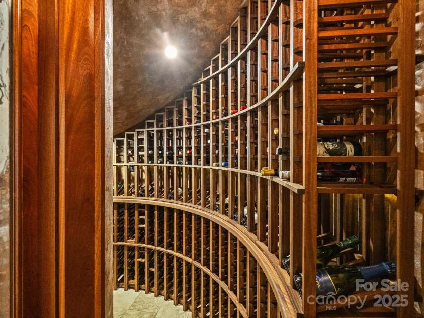 4400 Sharon View Road, Charlotte, NC 28226.  MLS# CAR4243534, YatesRealty ID 11056. Wine Cellar