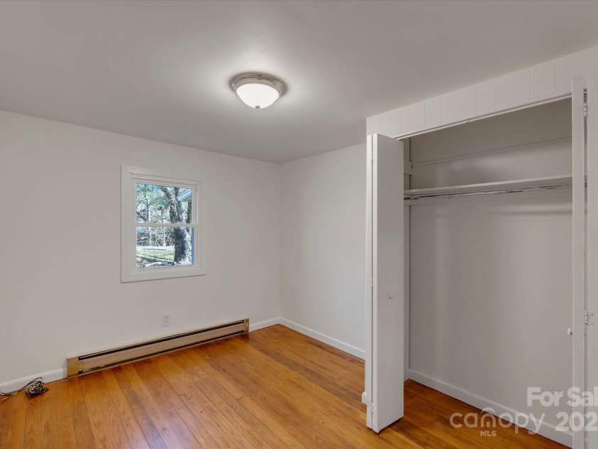 4 Morgan Cove Road, Candler, NC 28715.  MLS# CAR3898041, YatesRealty ID 11057. Bedroom 1