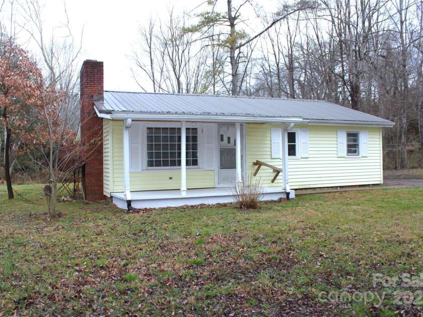 4 Morgan Cove Road, Candler, NC 28715.  MLS# CAR3898041, YatesRealty ID 11057. Covered front porch, perfect for rocking chairs.