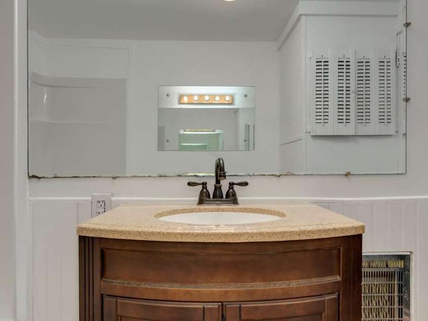 4 Morgan Cove Road, Candler, NC 28715.  MLS# CAR3898041, YatesRealty ID 11057. Newer vanity in the bathroom.