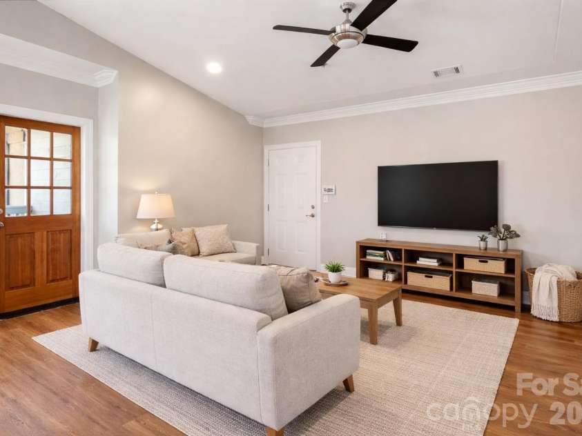 111 Summit Avenue, Charlotte, NC 28208.  MLS# CAR4356986, YatesRealty ID 11059. Great room has been virtually staged