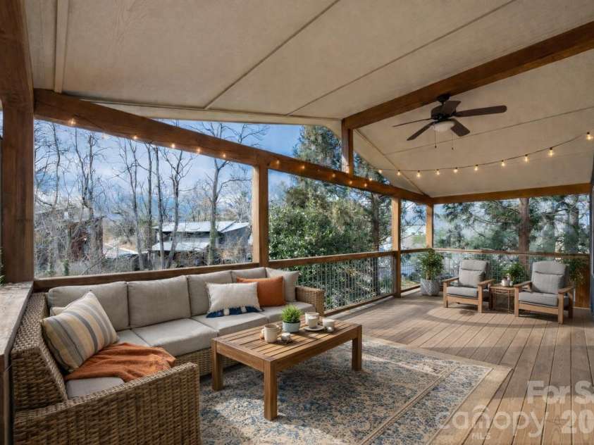 162 Deaver Street, Asheville, NC 28806.  MLS# CAR4343348, YatesRealty ID 11065. Virtually staged covered front porch