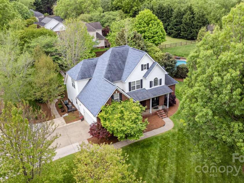 212 Horn Tassel Court, Indian Trail, NC 28079.  MLS# CAR4244678, YatesRealty ID 11066. Beautiful lawn and established landscape!